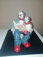 Gilde clowns grandfather+grandchild reading clowns