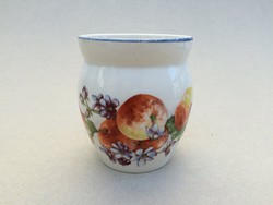 Old porcelain mug with silk apple flowers