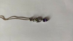 Silver neck blue necklace decorated with olivine and amethyst stones