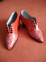 Pair of ceramic shoes