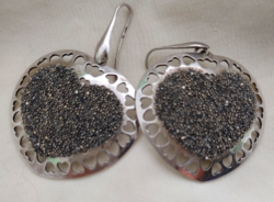Large heart-shaped silver earrings!