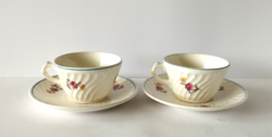 Set of 2 old blue-rimmed granite teacups with field flowers