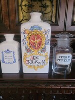 3 old pharmacy containers