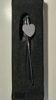 Engraveable heart-shaped metal bookmark in an elegant black gift box