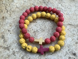 Pair of yellow and coral colored lava stone mineral friendship bracelets