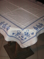 Azure woven tablecloth embroidered with beautiful blue cross stitches