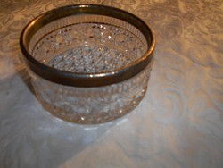 Glass serving bowl with metal border
