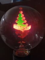Glimm bulb, glimm lamp burning - Merry Christmas