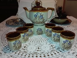 8-piece coffee set with warming saucer, spout, 6 cups.