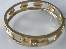 Gold-plated bracelet with polished crystal, marked, 6.7 cm inner diameter