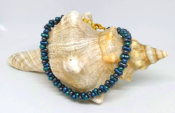 Blue colored matte metallic farfalle pearl bracelet