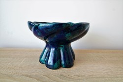 Beautiful blue-green ceramic flowerpot with a base