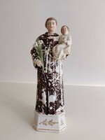 Old porcelain saint antal figure st. Anthony's religious statue is a blessing object
