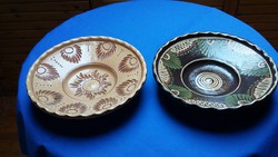 Two old glazed earthenware wall plates