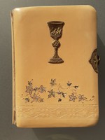 Old buckled Reformed prayer book