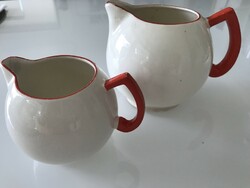 Art deco Czech ceramic pitchers in eggshell color with bright red handles