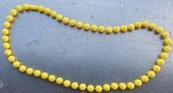 Old market bijou necklace - plastic yellow string of beads