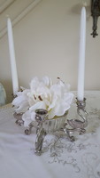 Beautiful, silver-plated swan candle holder with glass flower arrangement