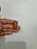 Old silver ring with amber