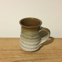 Ceramic pitcher with stone effect