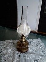 A kerosene lamp that can be hung on the wall, with the inscription 