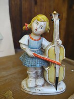 Old porcelain cello figurine