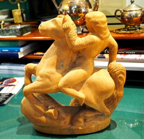 Wooden sculpture with ceramic effect