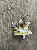 A cute Christmas tree decoration made of old and new elements