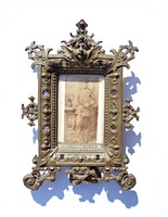 Old bronze photo holder with polished glass
