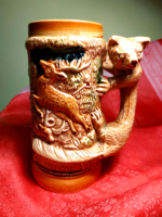 Ceramic jug with wild animal relief for hunters!