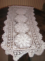 Hand-crocheted floral snow-white tablecloth with beautiful Art Nouveau features