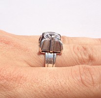Silver ring made in a large polished stone mint
