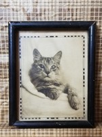 A lovely cat of a family. Cat portrait in a frame from the 1950s.