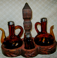 Old vinegar oil pouring salt pepper shaker in table holder in amber