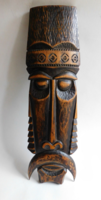 Large, folk art carved wall ornament - head - with markings
