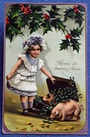 Antique embossed New Year greeting card little girl with suitcase with pigs mistletoe holly branch