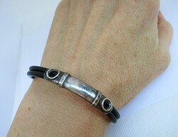 Very special old rubber silver bracelet