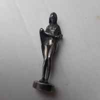 Discreet erotic metal figurine
