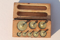 Pharmacy scale copper weights in a wooden box