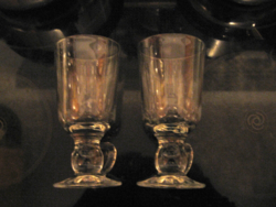 A pair of glasses with Irish coffee ball stems