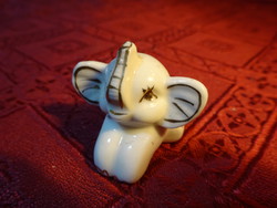 German porcelain mini elephant baby with gold decoration, length 3.5 cm. He has!
