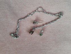 Silver set with peridot green stones