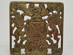 Copper four-legged table with the royal coat of arms of the United Kingdom