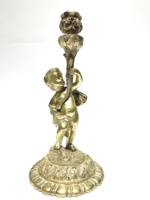 Gilded putto candle holder