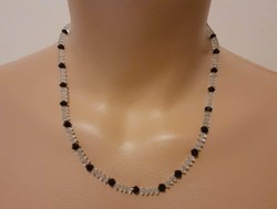 A charming necklace of black and white polished glass (or crystal) beads