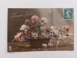 Old postcard with floral postcard flower basket