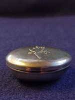 Silver medicine box with flowers