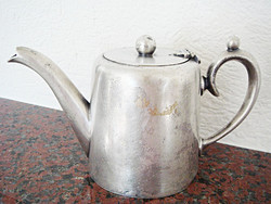 Antique old coffee pot with vintage metal spout