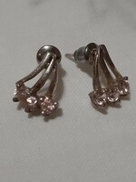 A pair of silver earrings with rose quartz stones