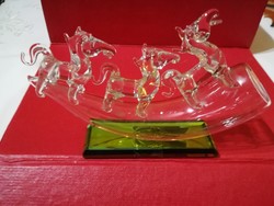 Handmade glass ornament with horses.